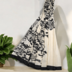Classic Creamy Off White with Black Silk Saree